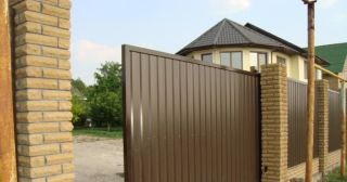 Купить откатные ворота из профнастила Мегион, цена от 1742 руб.